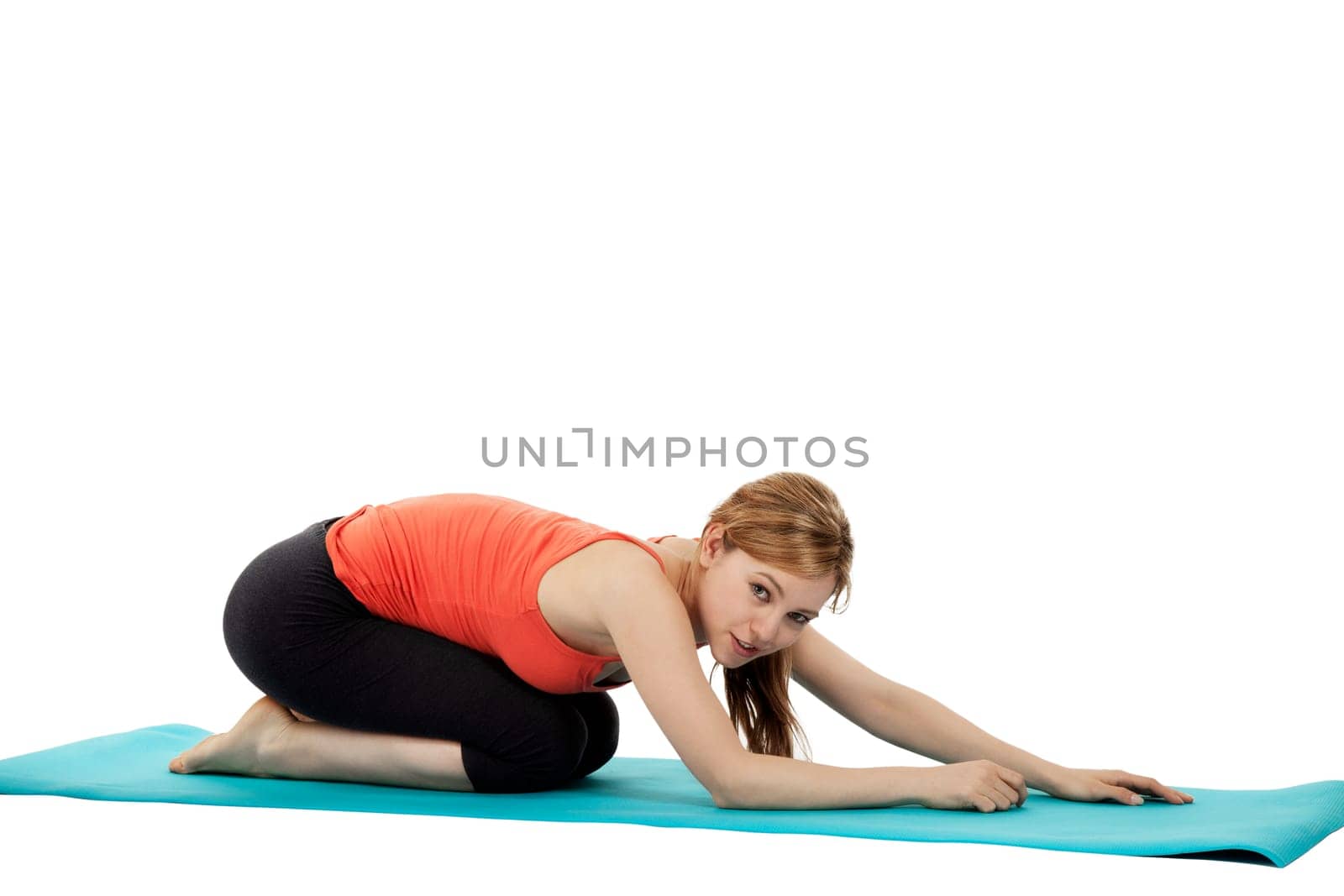 Happy sportswoman doing fitness exercises on white background