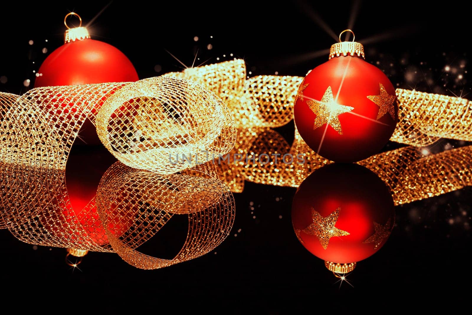 Red Christmas Tree Baubles with Golden Metal Ribbon on Black Background