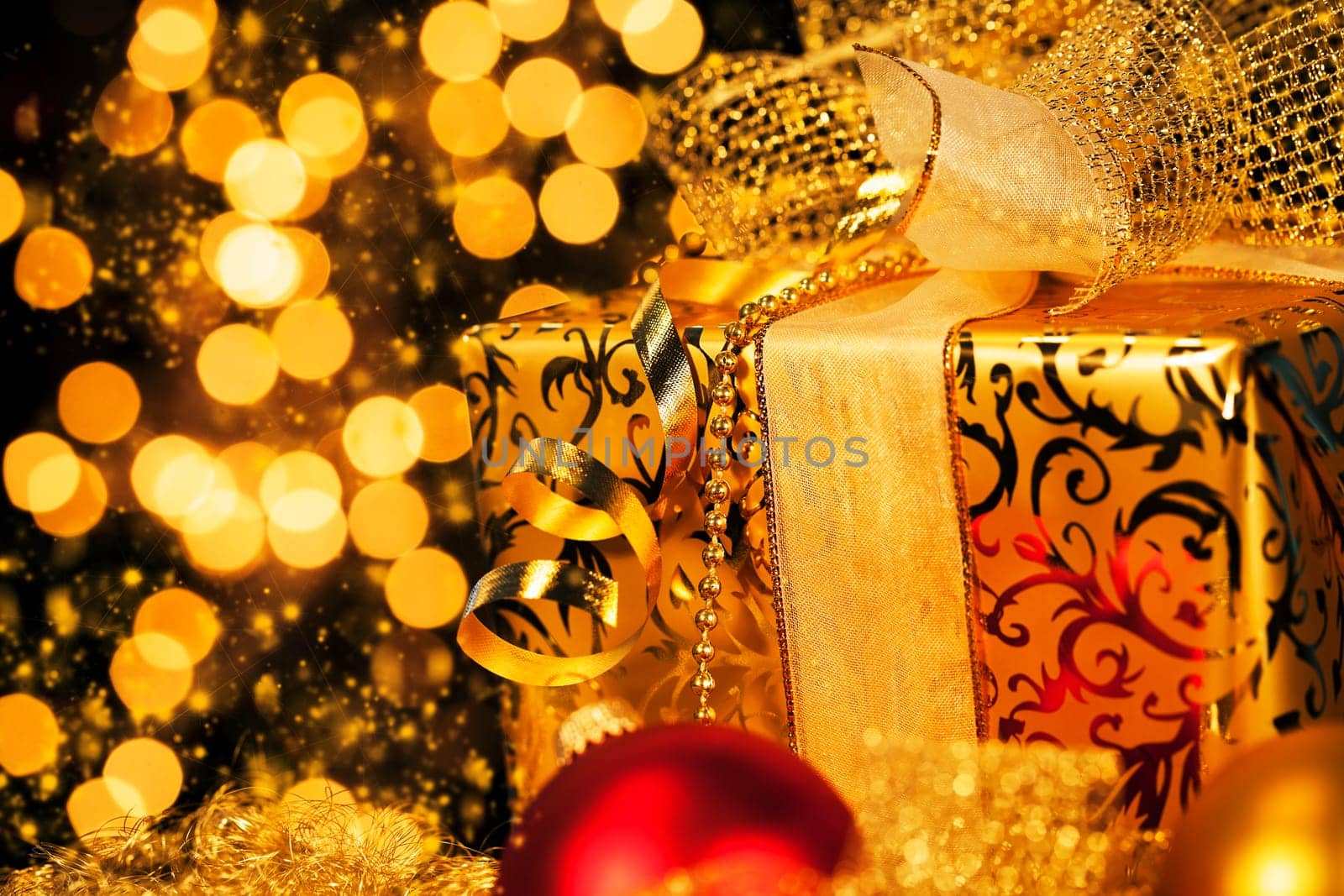 Luxurious Christmas gift in golden light