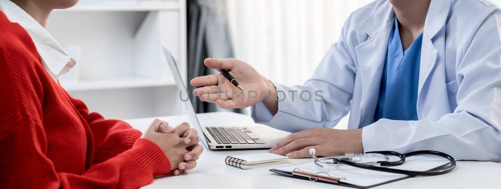 Laptop display medical report or diagnostic result of patient health on blurred background of doctor's appointment in hospital. Medical consultation and healthcare treatment. Panorama Rigid