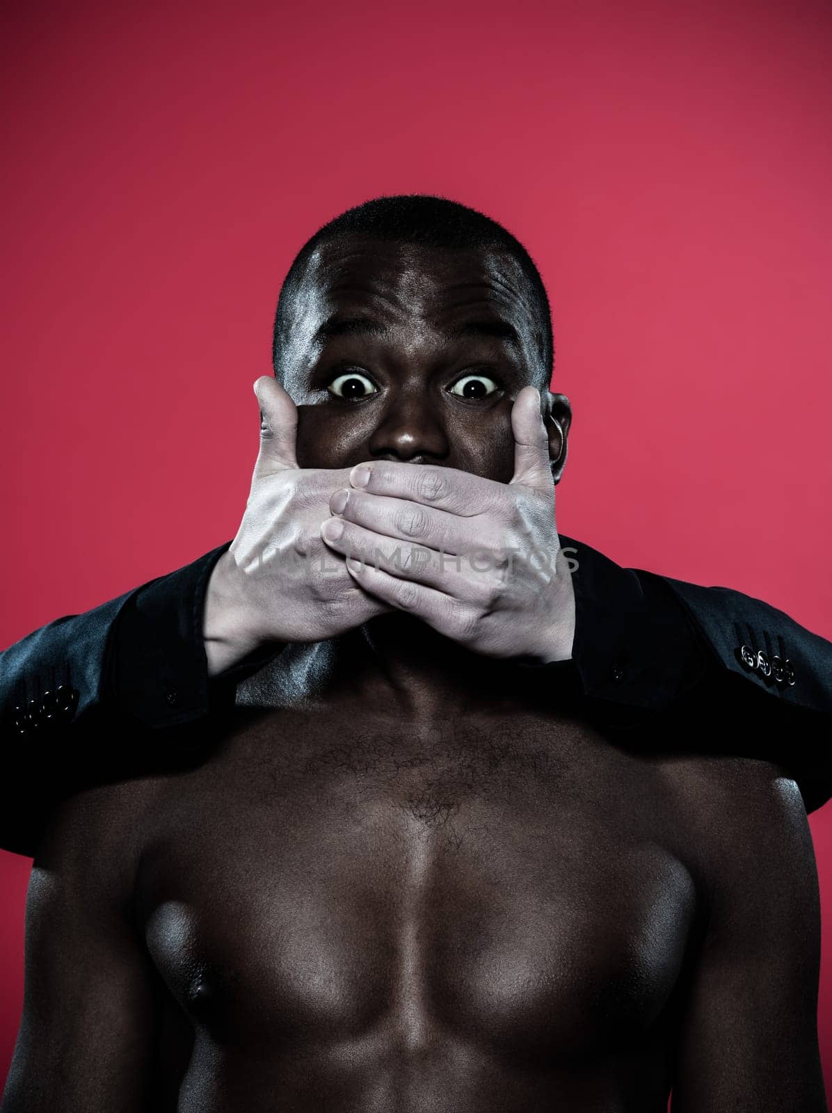 one african man hand on his mouth Freedom of speech concept