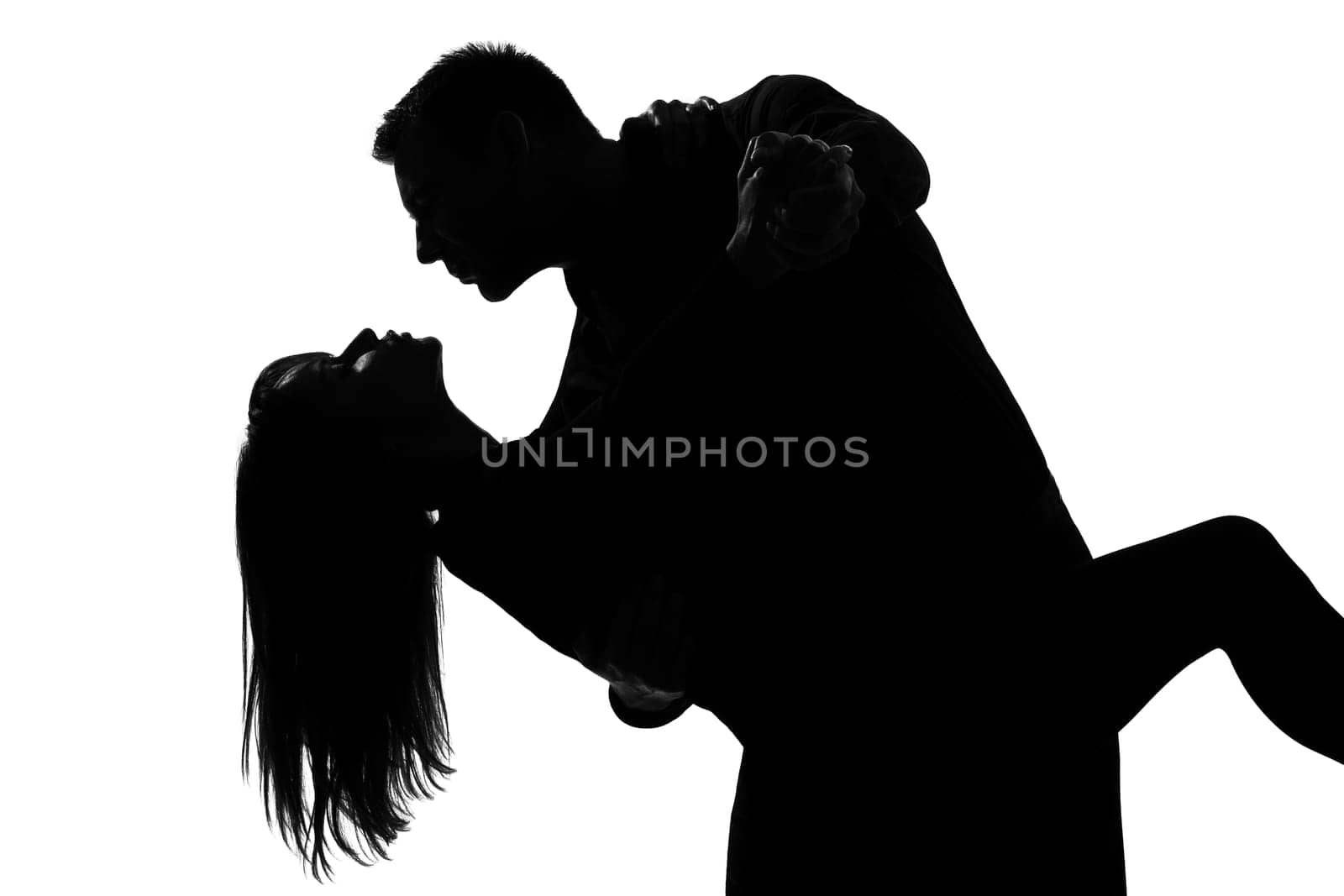 one caucasian couple lovers  man and woman dancing tango in studio silhouette isolated on white background