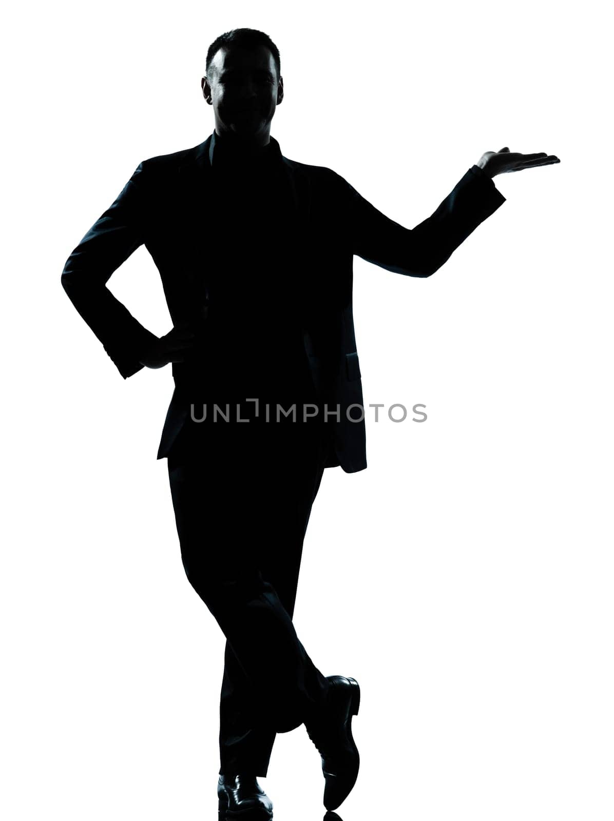 one caucasian business man silhouette standing hand open  Full length in studio isolated on white background