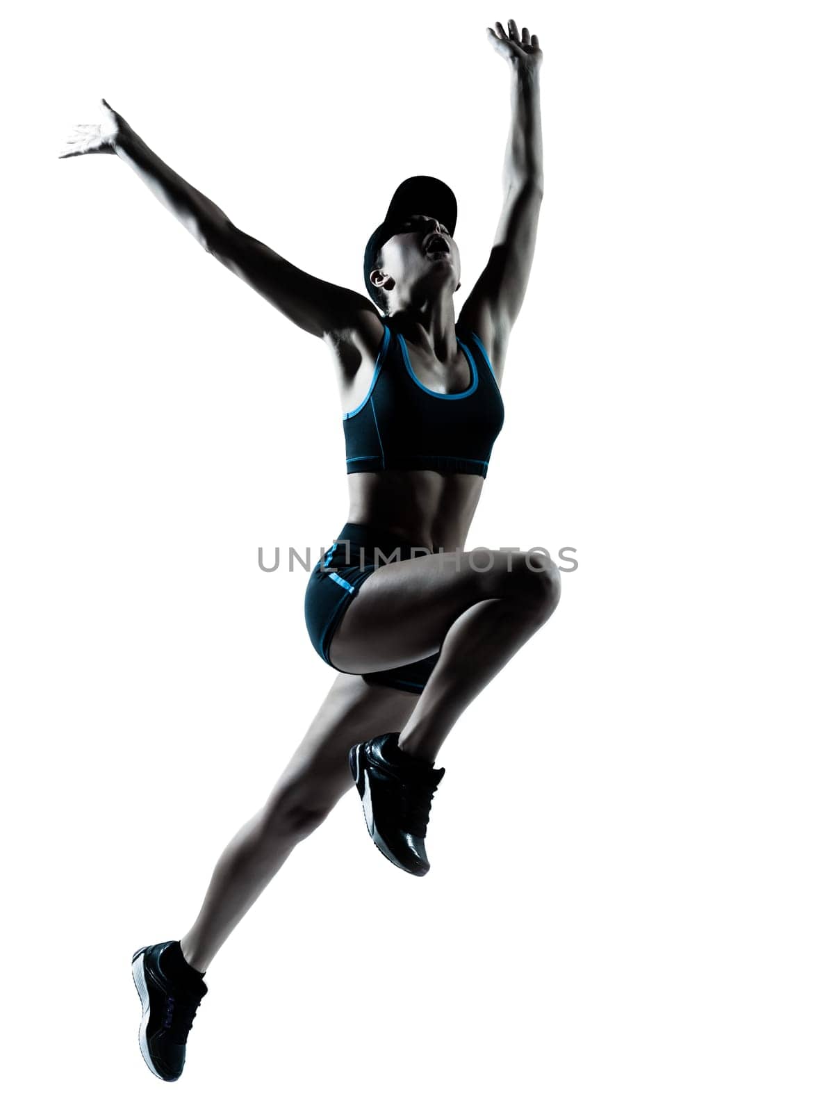 one caucasian woman runner jogger jumping in silhouette studio isolated on white background