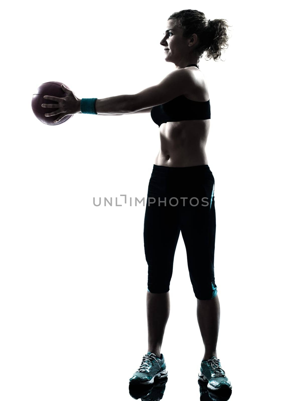 one caucasian woman exercising fitness ball workout posture in silhouette studio isolated on white background
