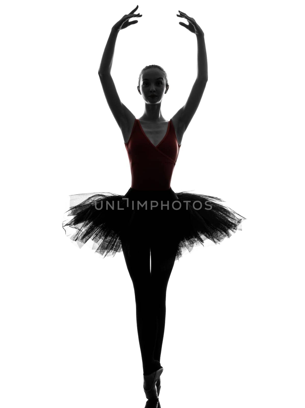 one caucasian young woman ballerina ballet dancer dancing with tutu in silhouette studio on white background