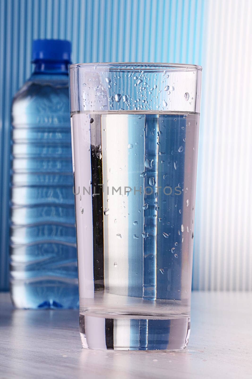 composition with gflass and bottle of water