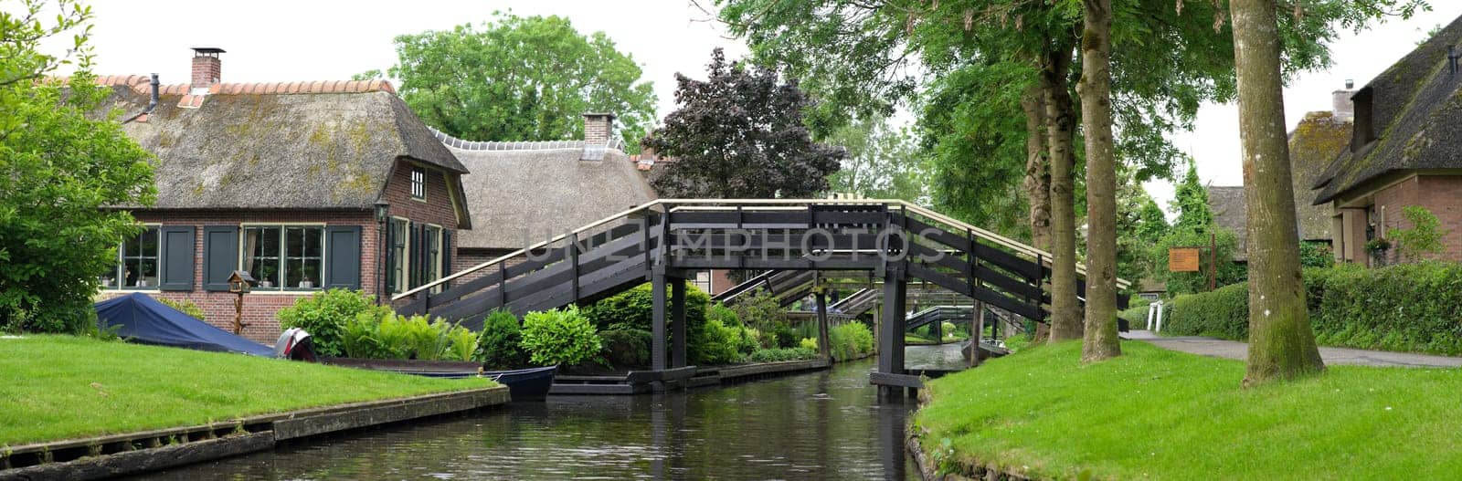 the idyllic Village of Giethoorn, also knows as Venice of the Netherlands, with its typical houses, bridges and canals
