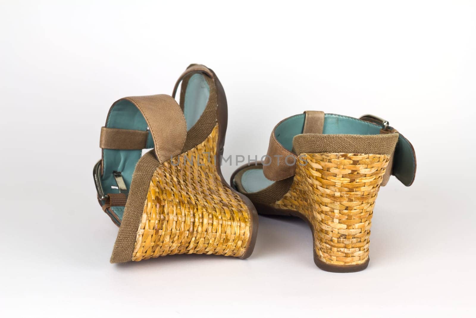 A pair of ladies wedge heeled shoes