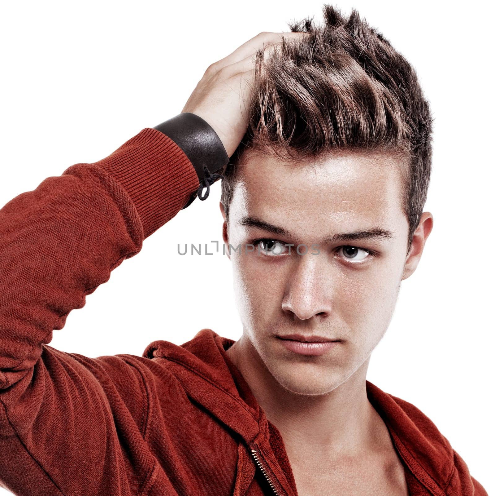 Young handsome man in red blouse looking aside