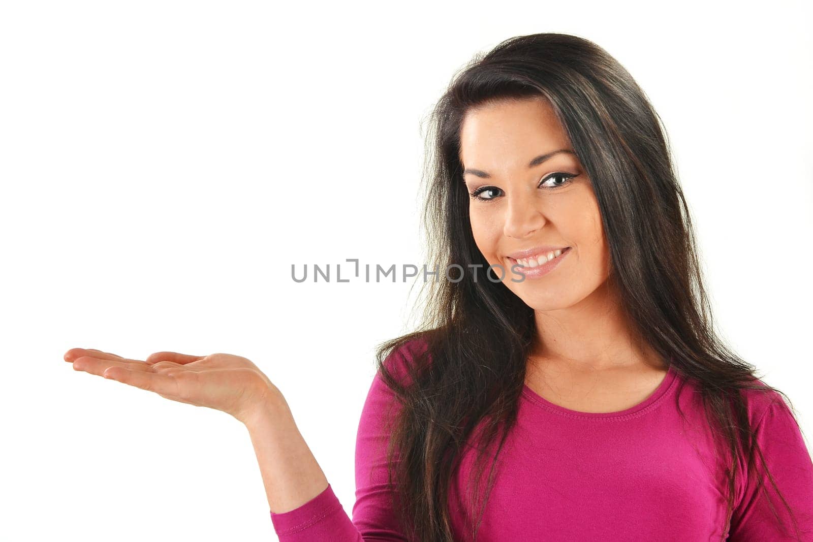 Young attractive woman with hand presenting your product isolated on white