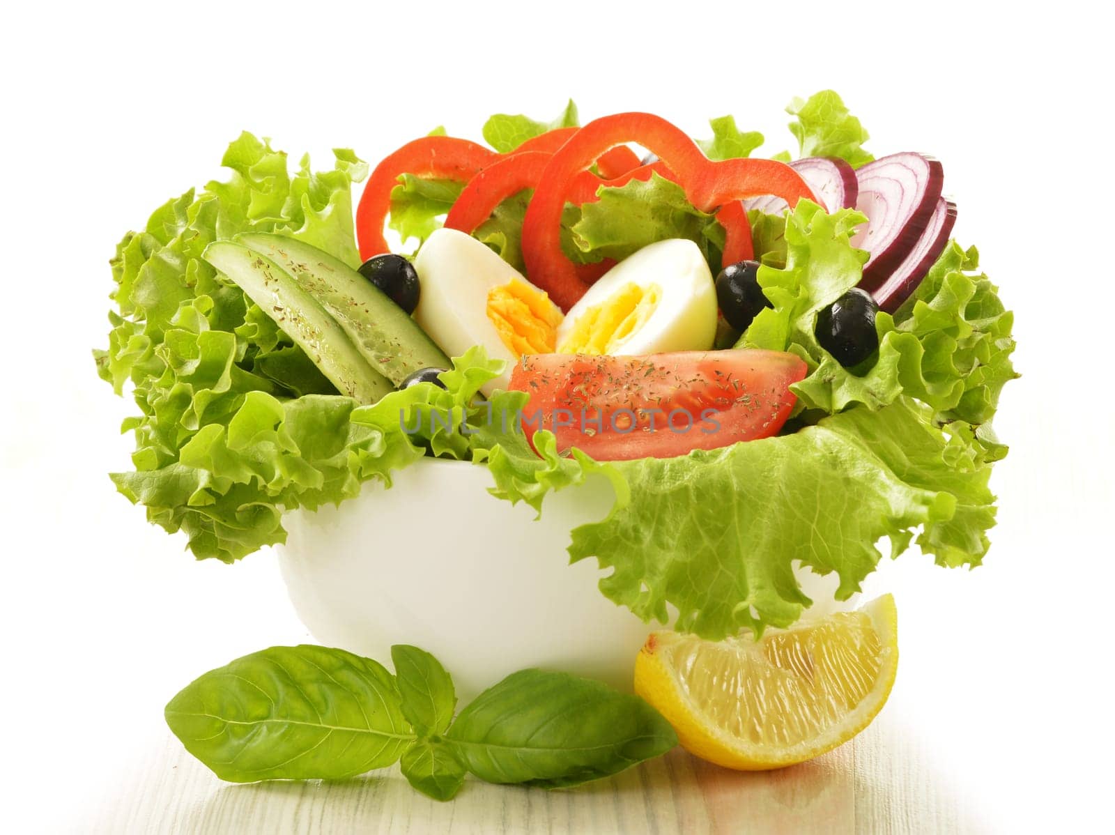 Vegetable salad bowl isolated on white