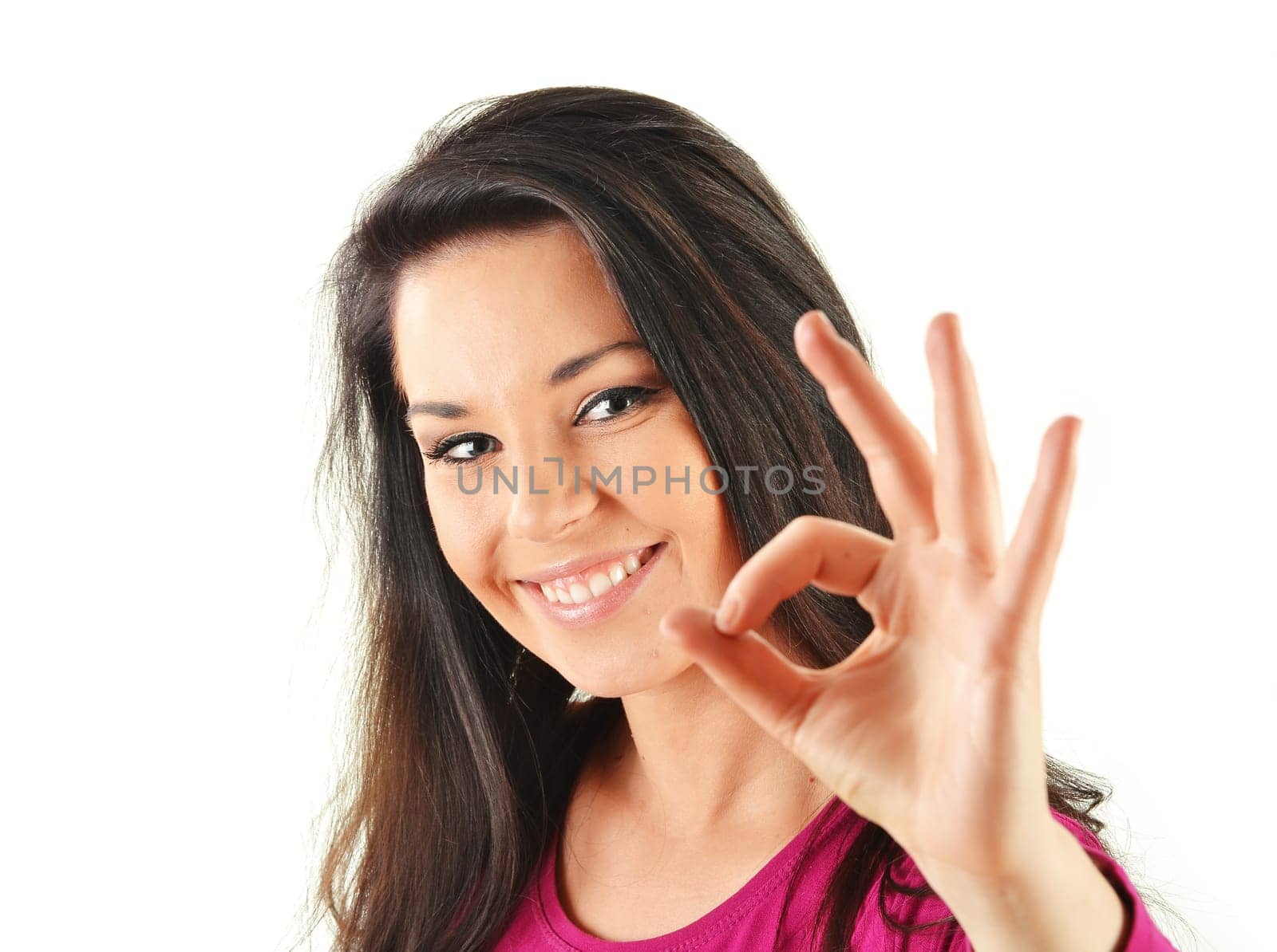 Young attractive woman showing ok isoleated on white