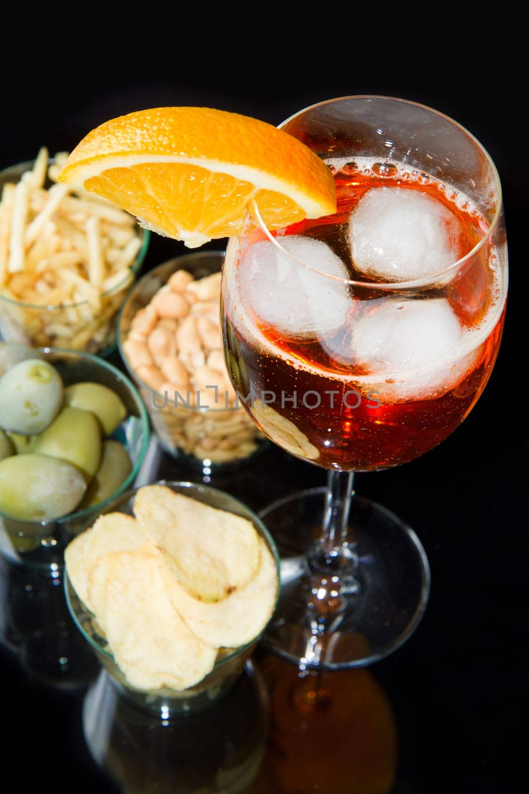 long drinks with oranges and appetizers