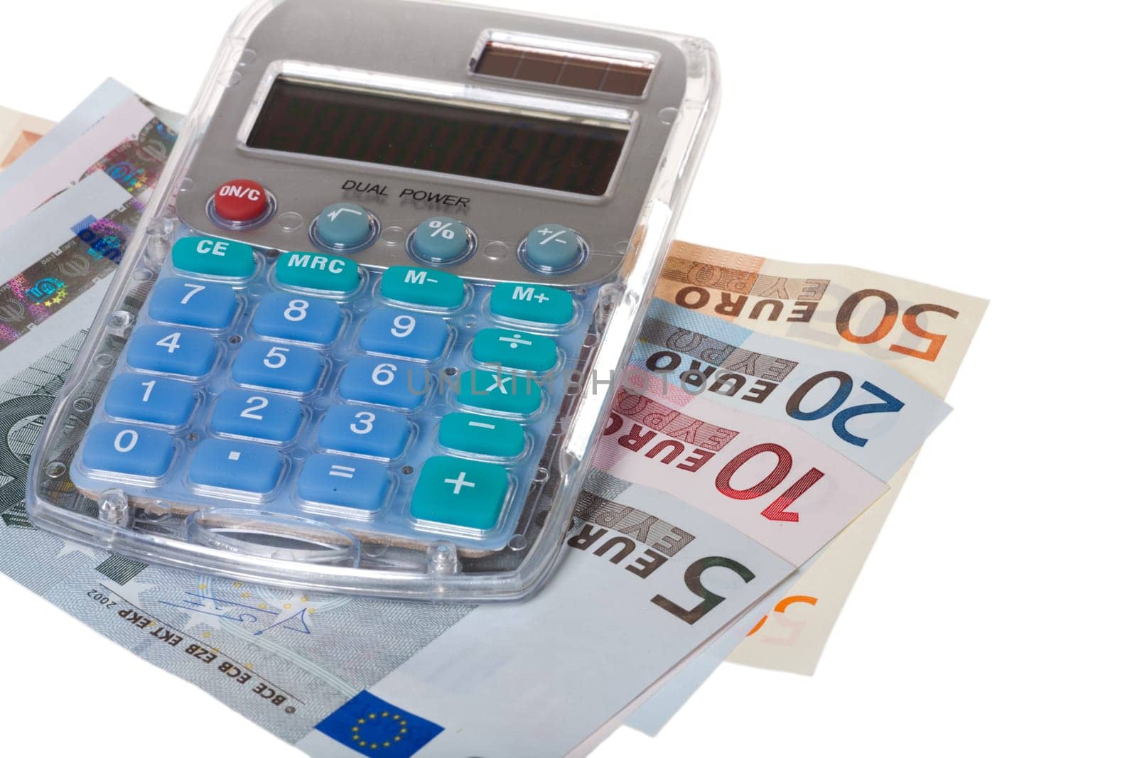 Calculators and banknotes - calculators and banknotes against white background