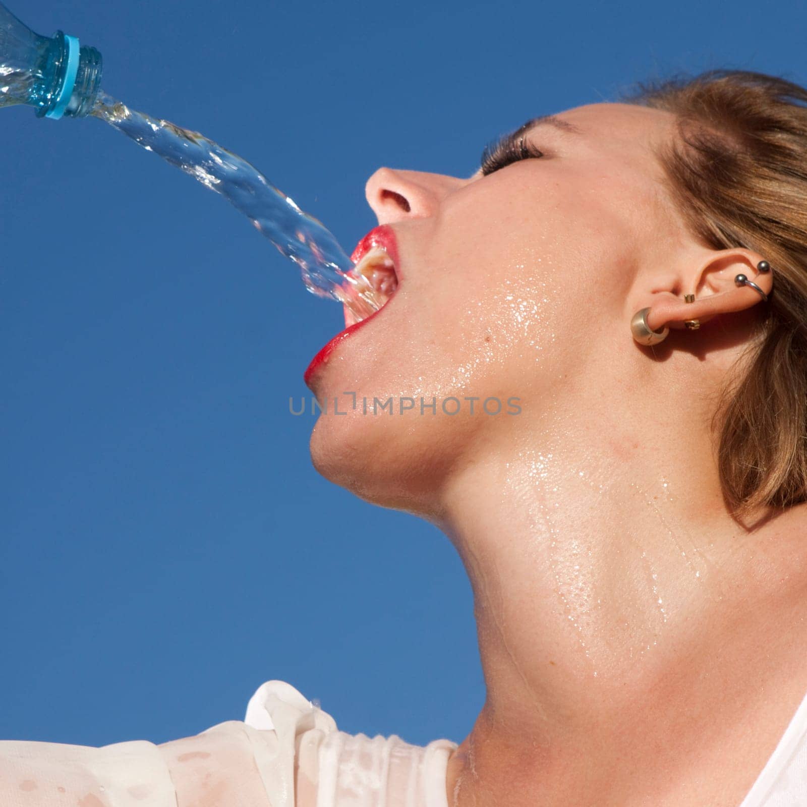 Young woman drinking water