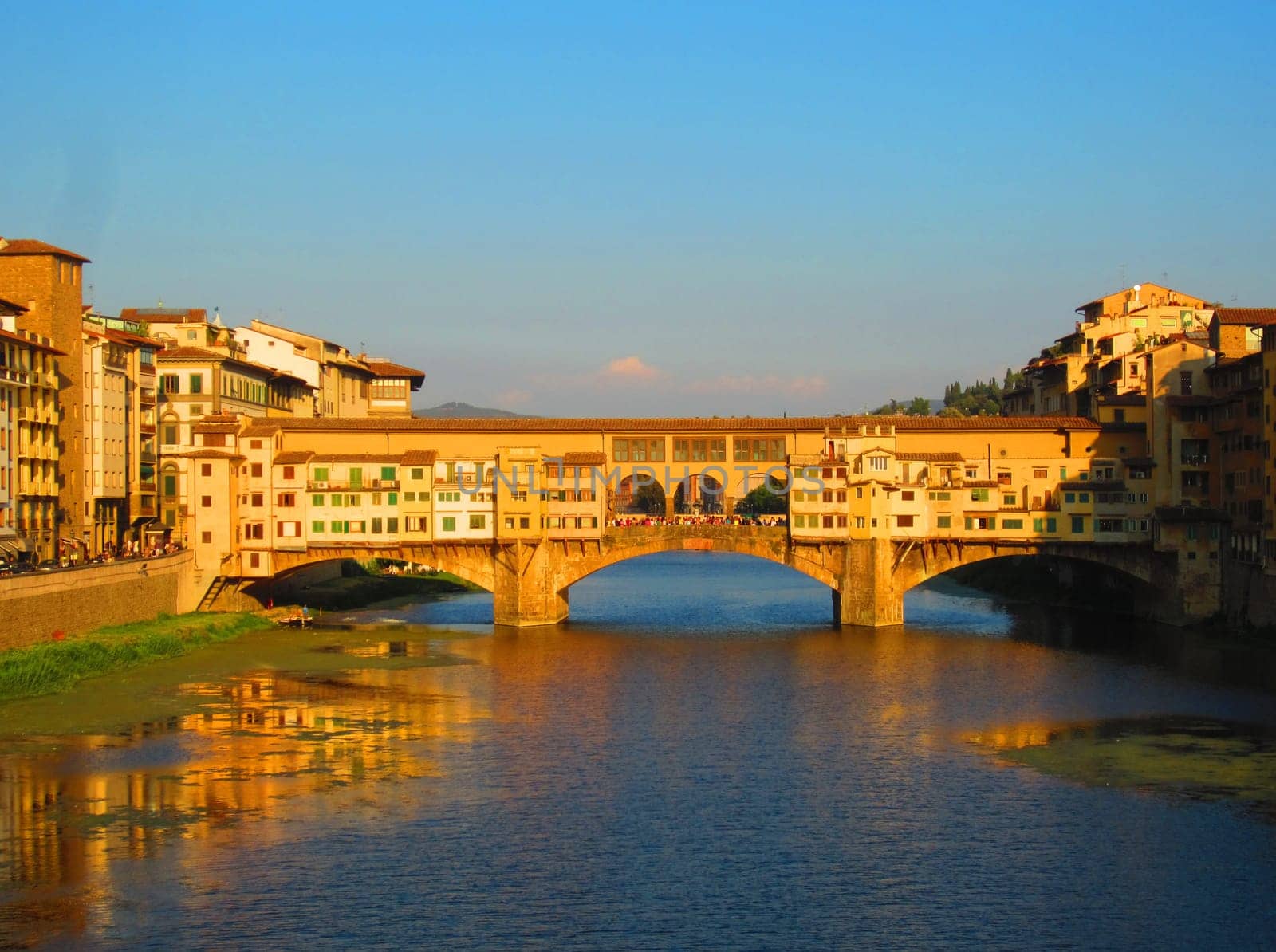 Sunset in Florence with river Arno and Ponte Vecchio