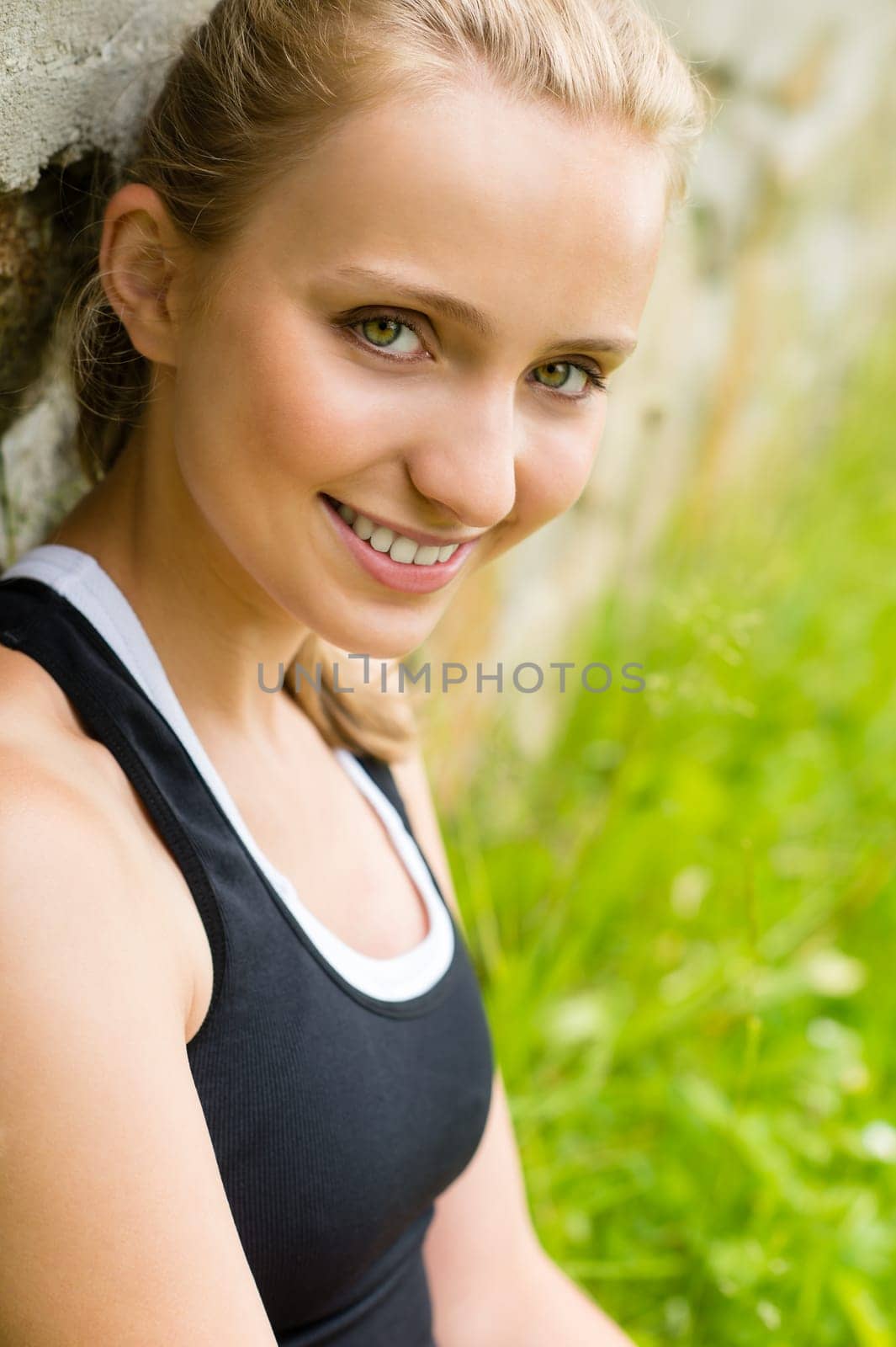 Close-up young fresh woman outdoors smiling portrait leisure