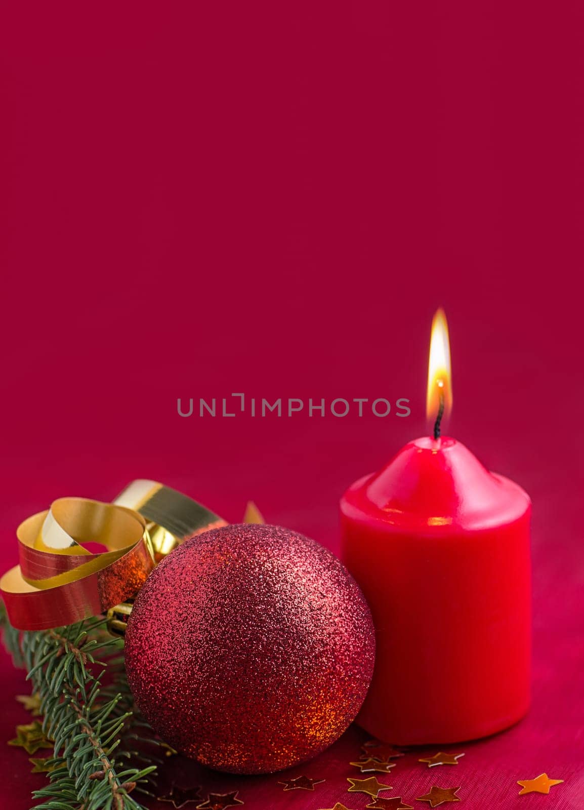 Christmas decoration with baubles and candle