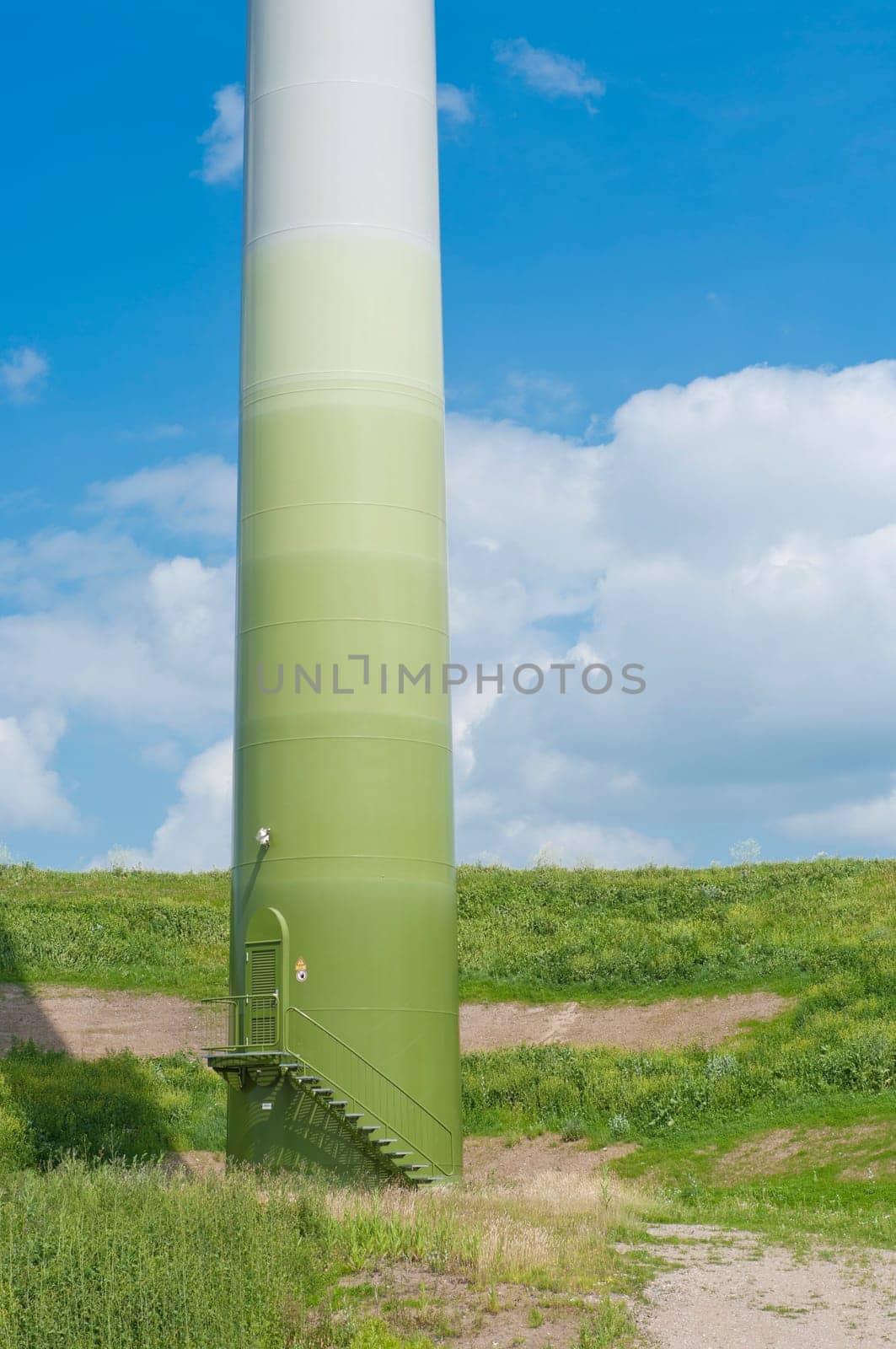 lower part of a wind turbine in different kinds of green
