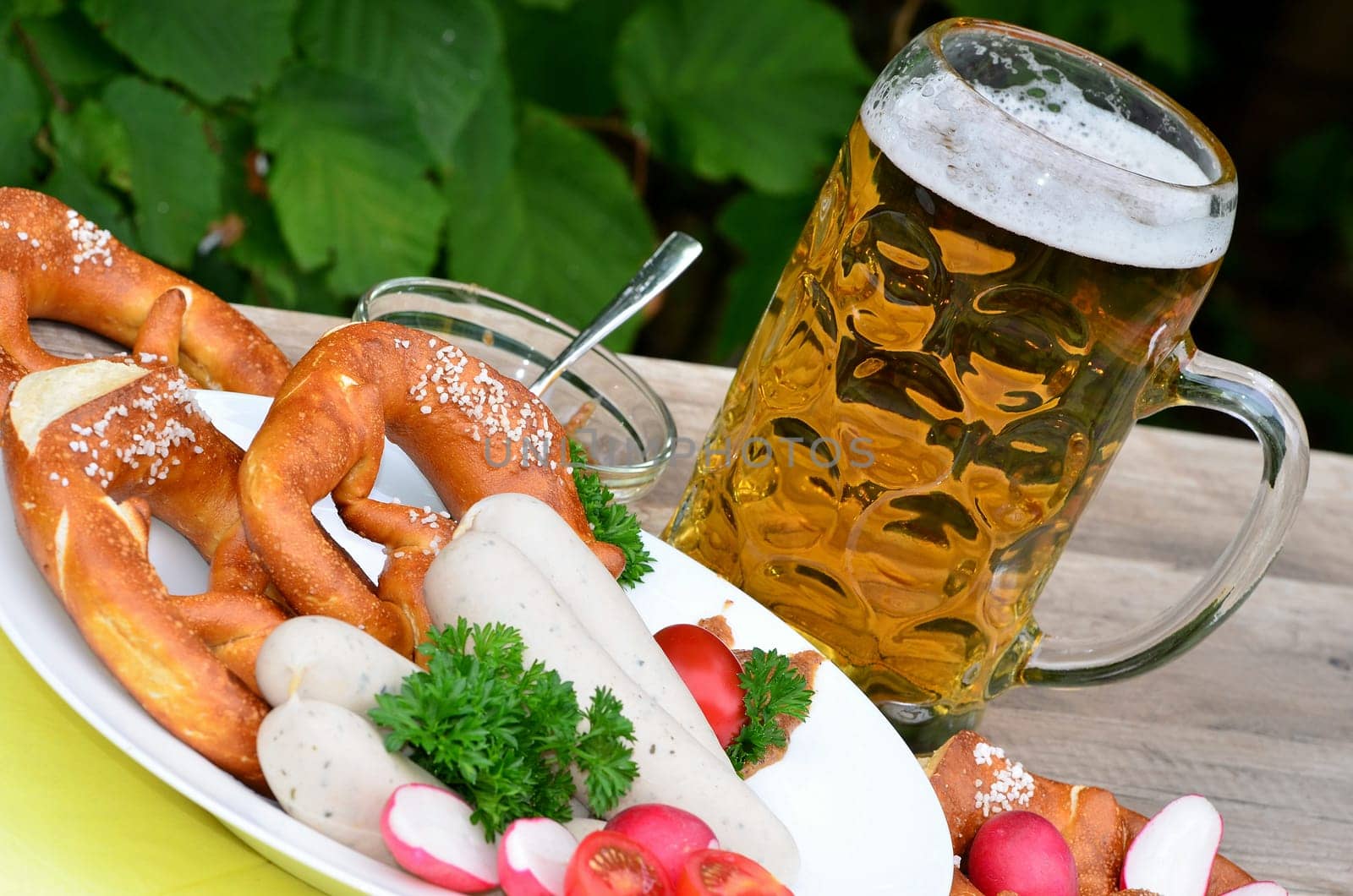 Bavarian snack with white sausages,beer and pretzels