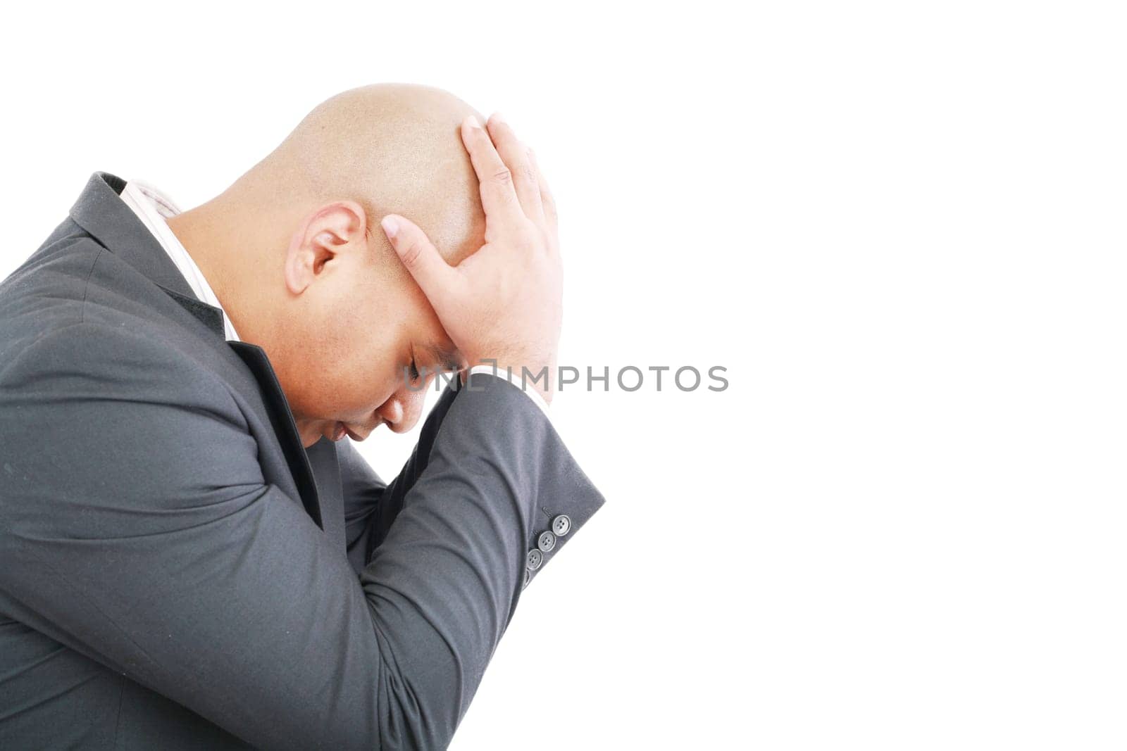 portrait of young businessman depressed and sad