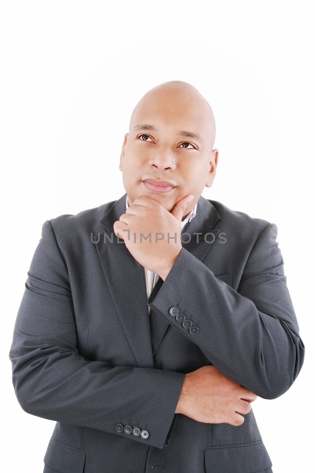 Portrait of handsome young thoughtful businessman isolated over white background