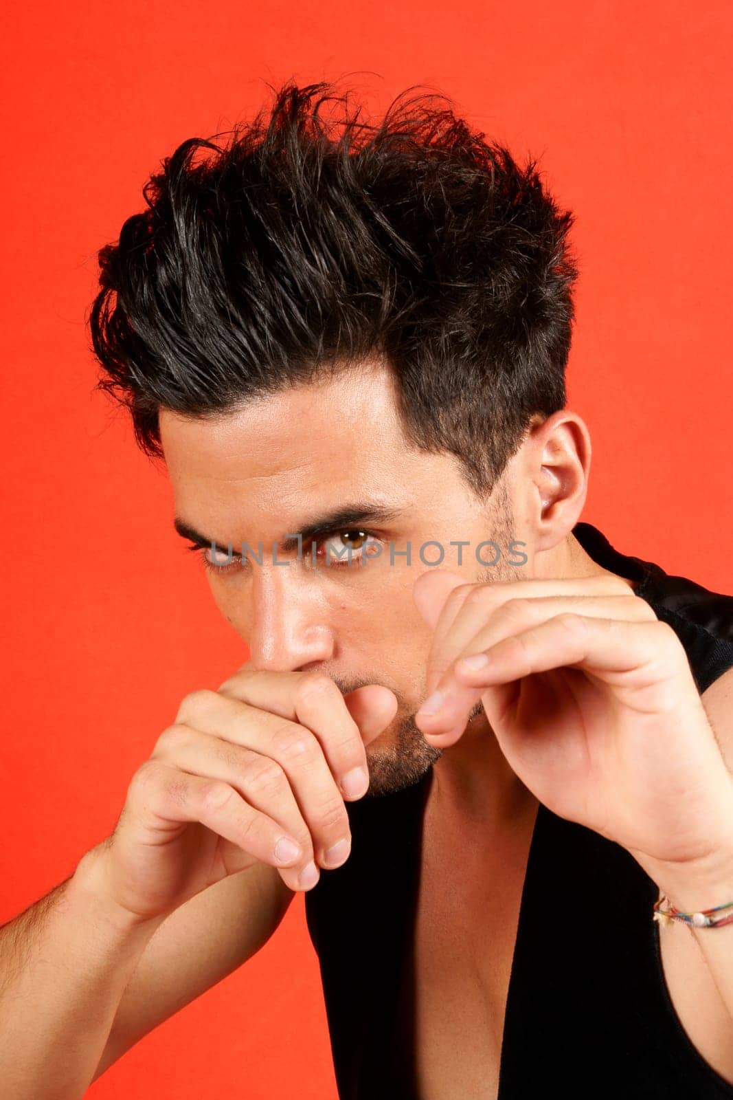 30 years old, bare-knuckle boxer over an orange background.
