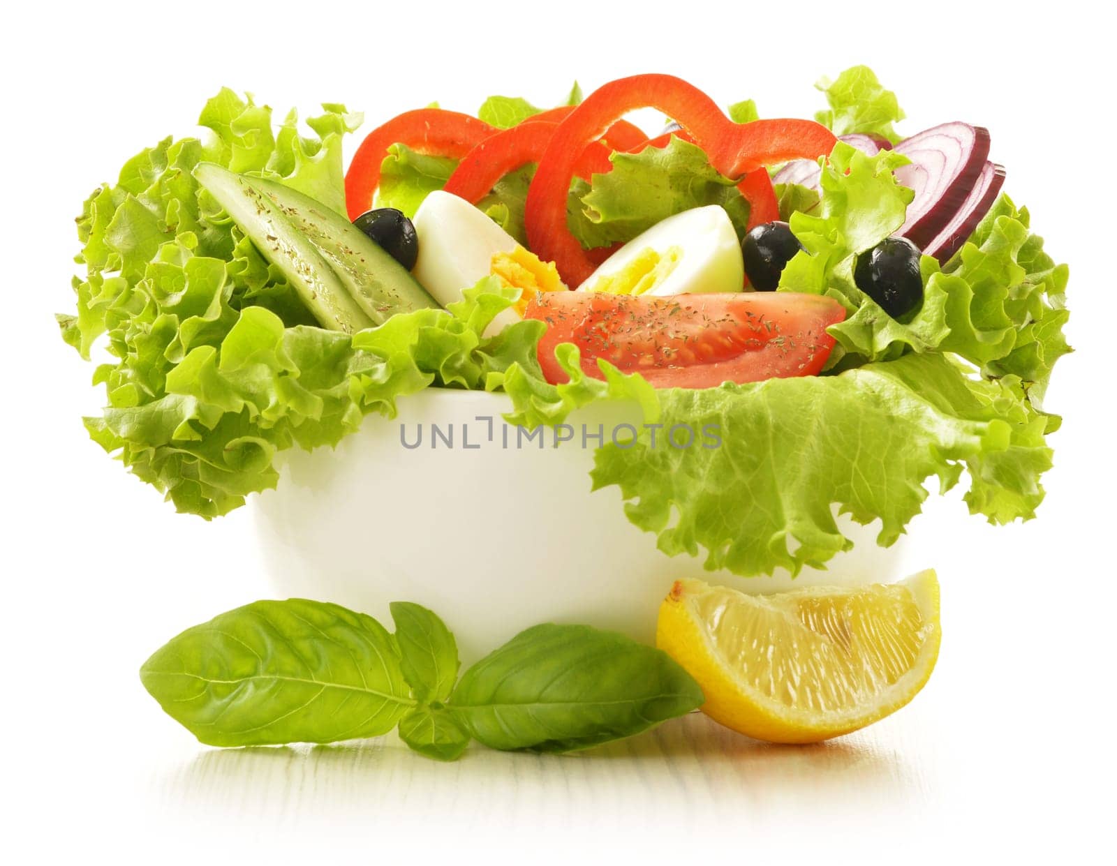 Vegetable salad bowl isolated on white