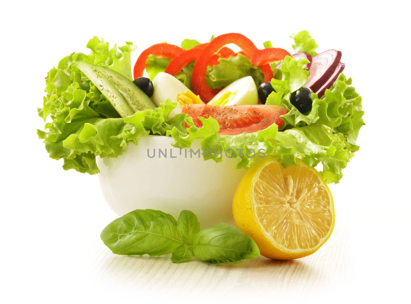 Vegetable salad bowl isolated on white