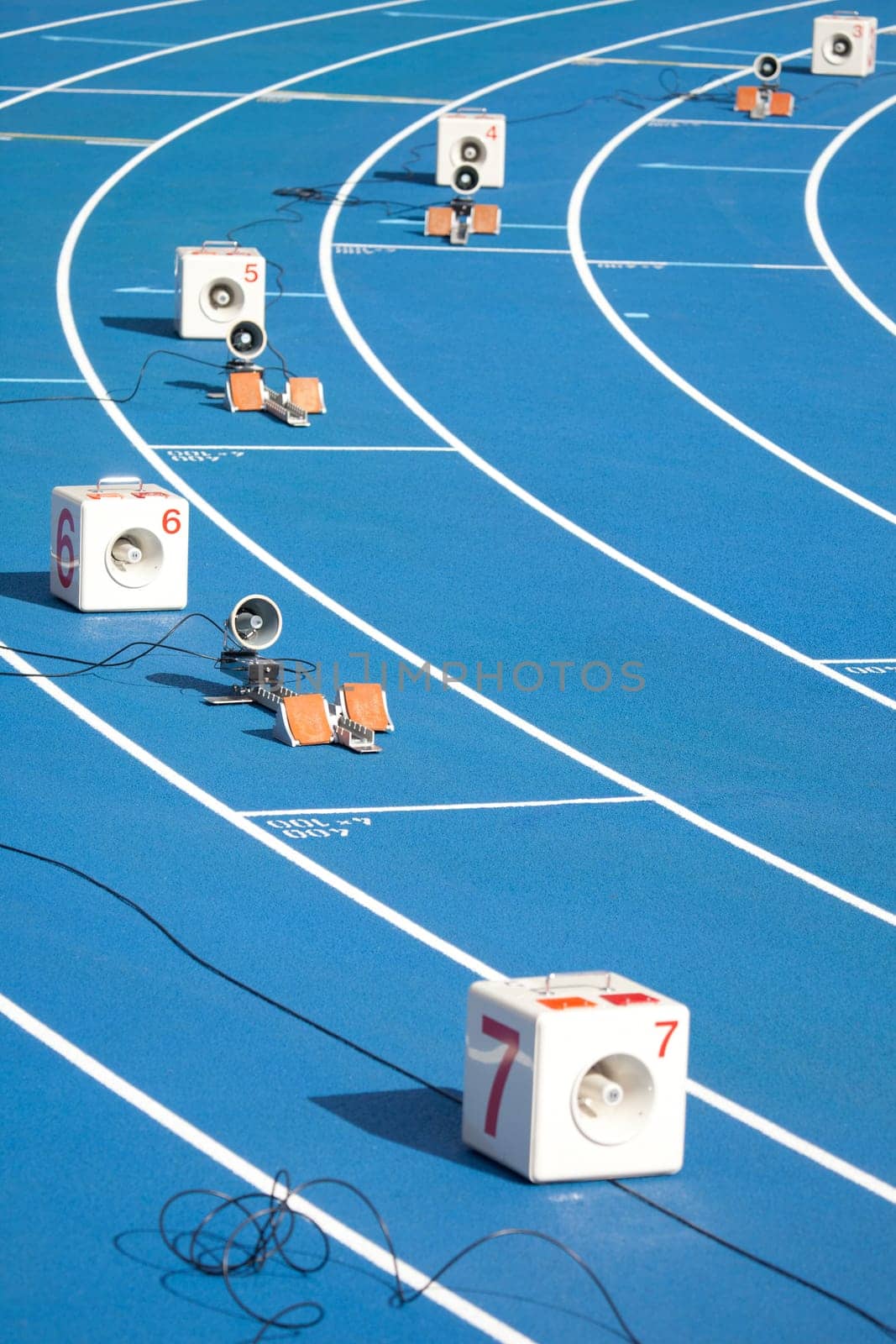 Start block of sprinters and loudspeaker