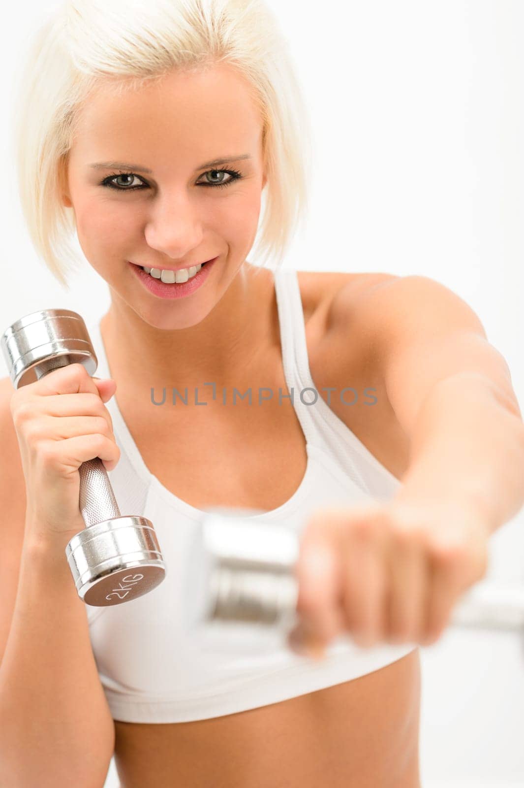 Fitness happy woman exercise with weights isolated on white