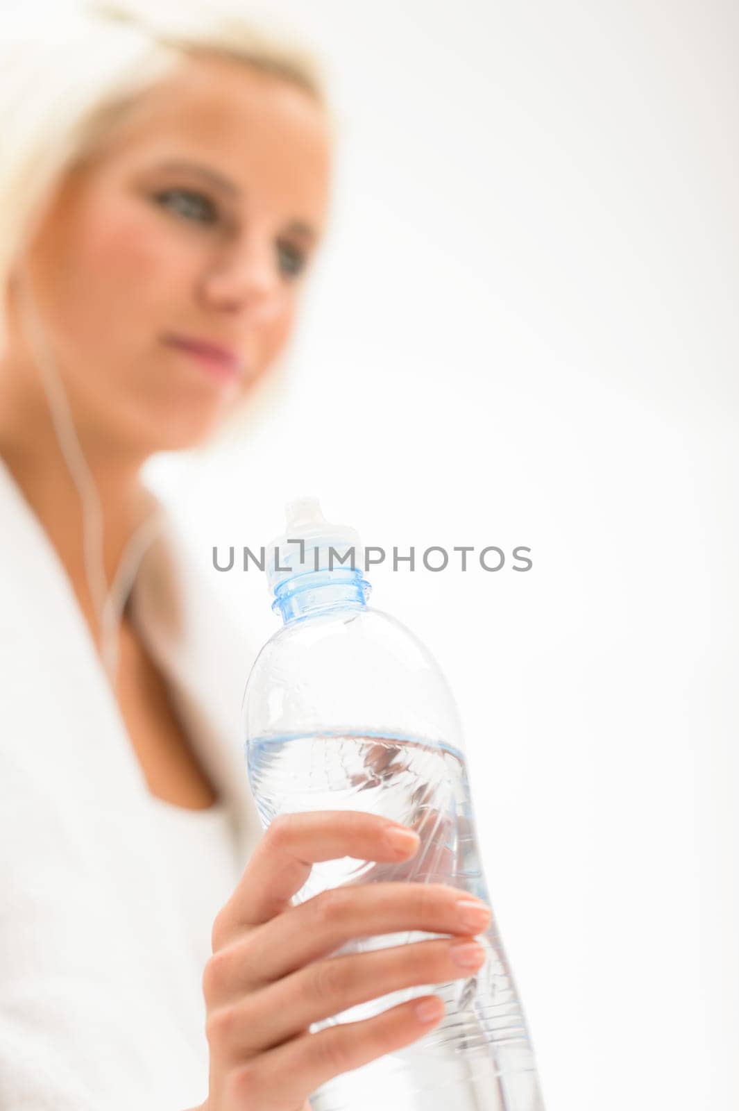 Fitness water bottle woman in background isolated on white