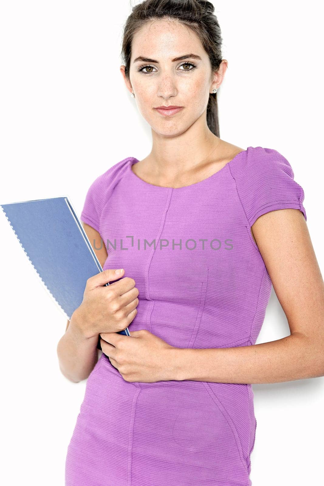 Professional business woman holding blue folders in a purple smart dress