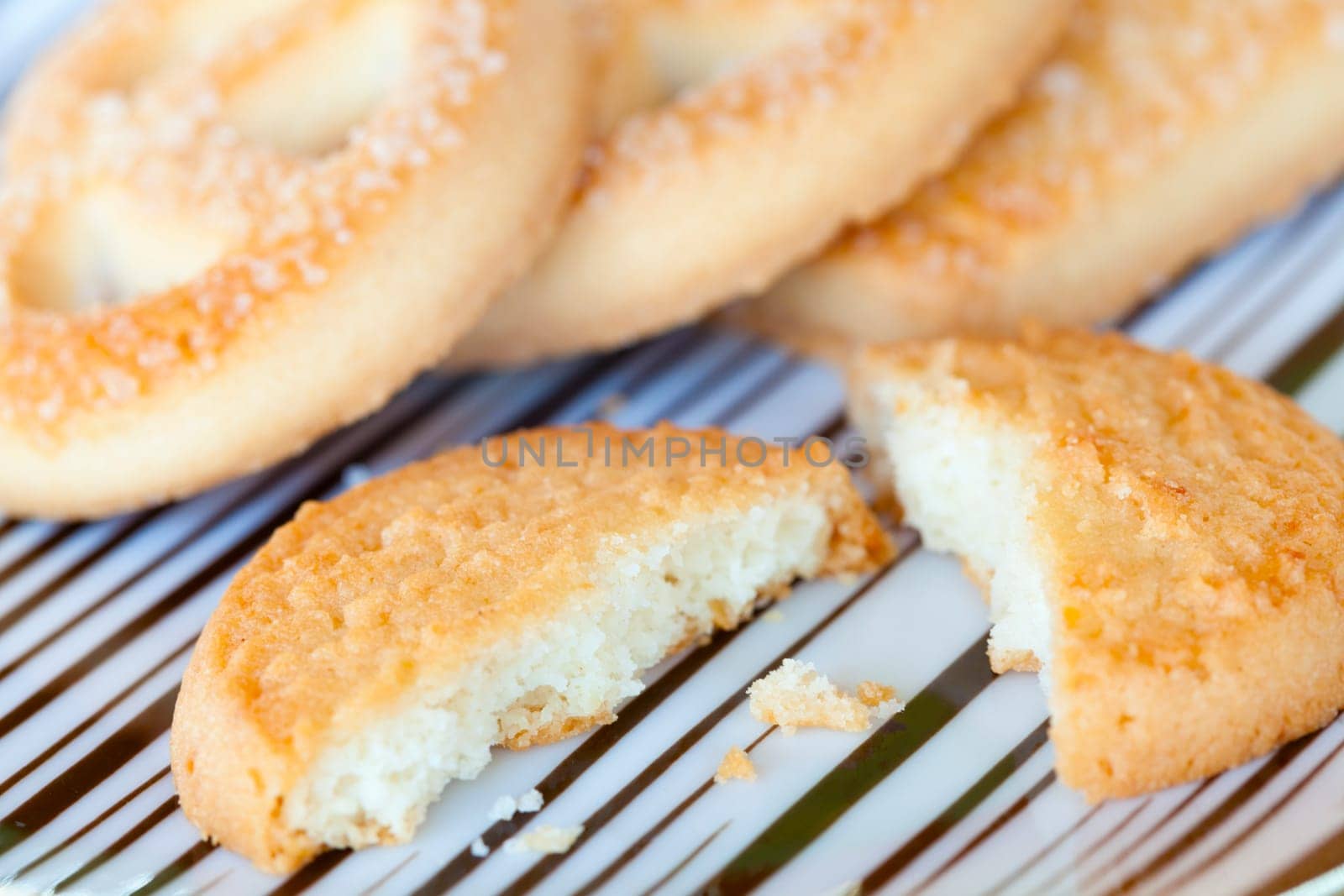 Extreme closeup of fresh butter cookies on a plate