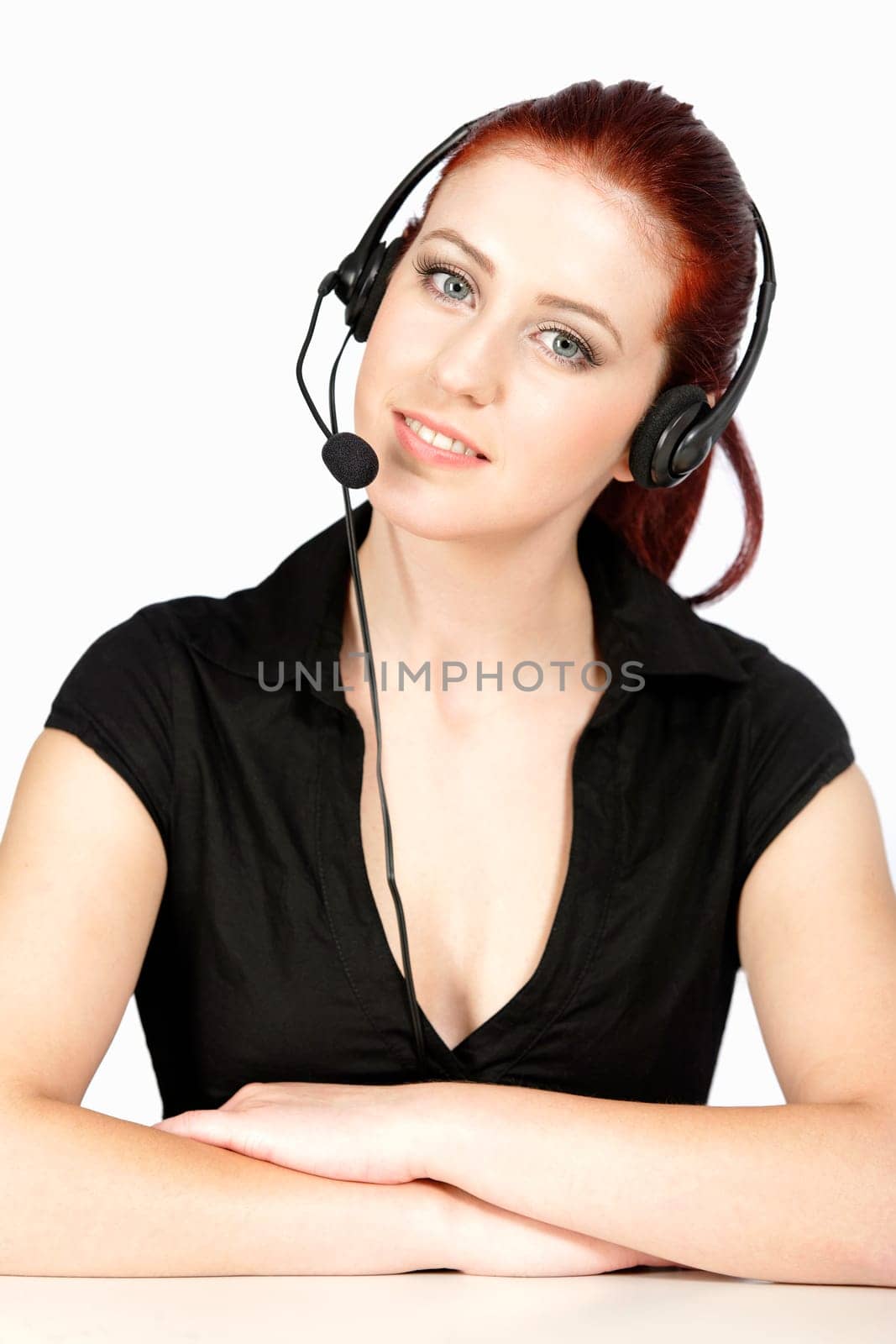 Professional woman talking on a headset in her office at work. With white background