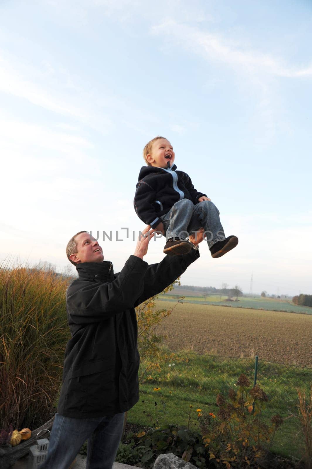 Family fun - father throws up child -