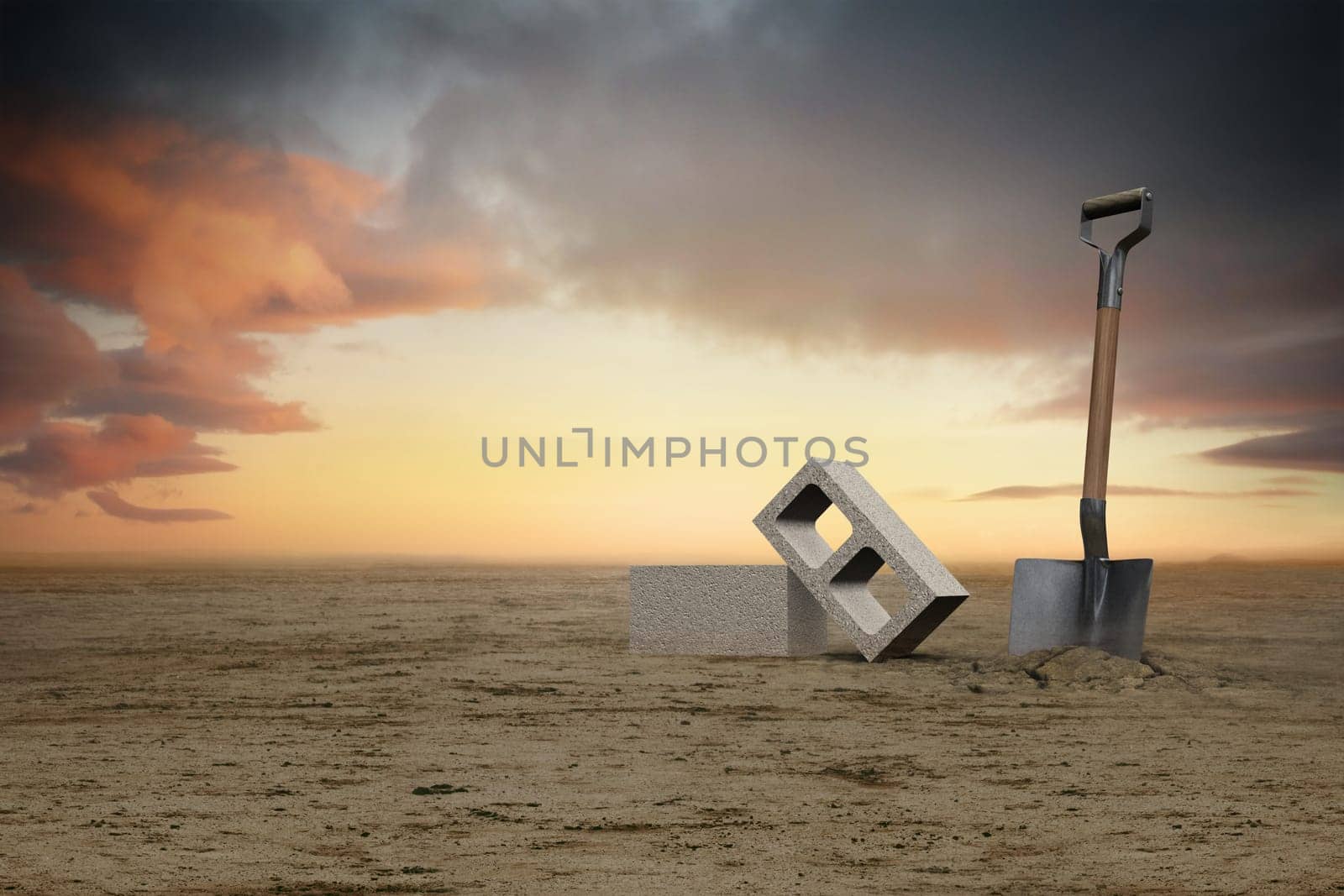 A photo of an empty field, a brick & a shovel to indicate the start of a project.