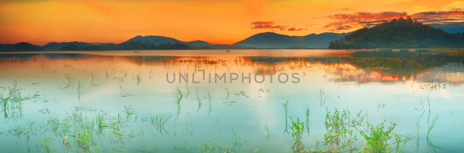 Panorama of a Lak lake at sunrise