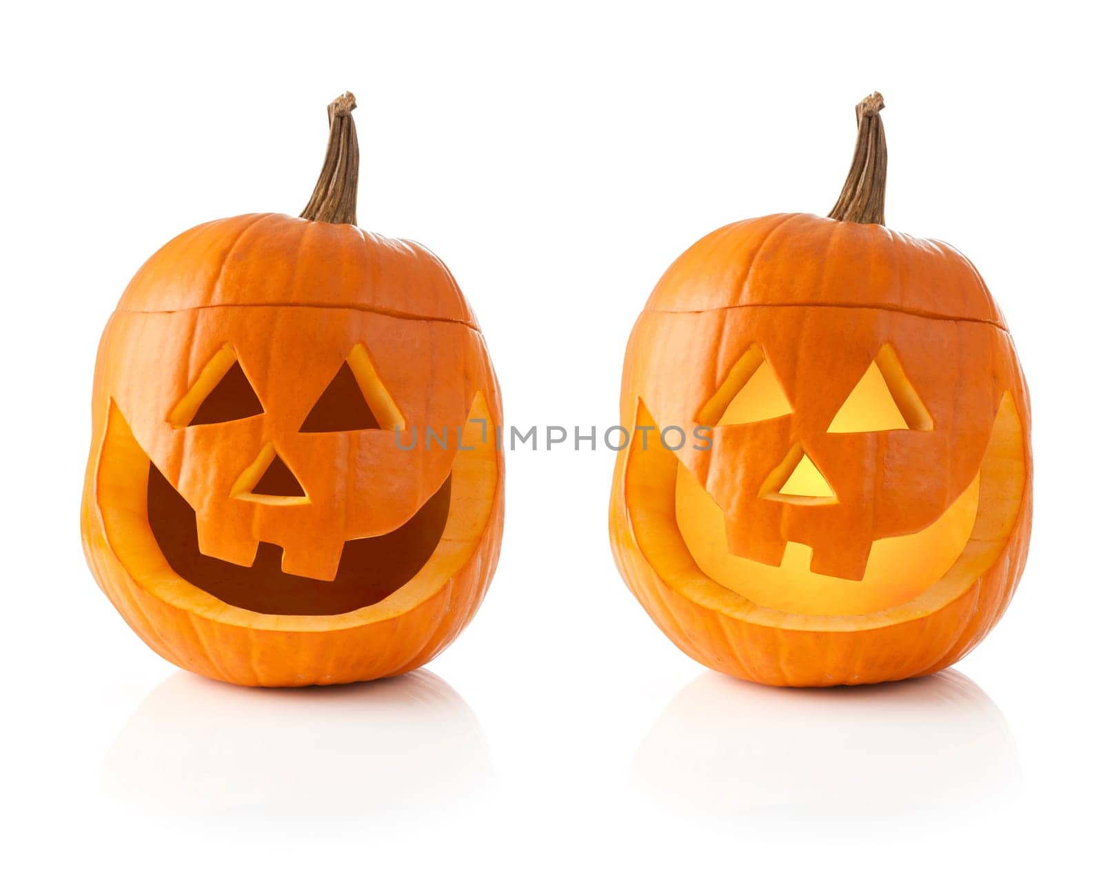 Jack O&#039  lantern isolated on white background lit and unlit