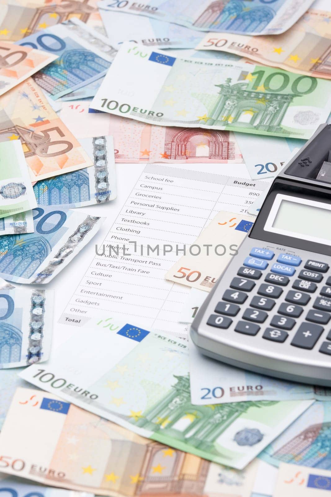 Printed student&#039 s budget, money and calculator. Student&#039 s pocket money (with rich parents).