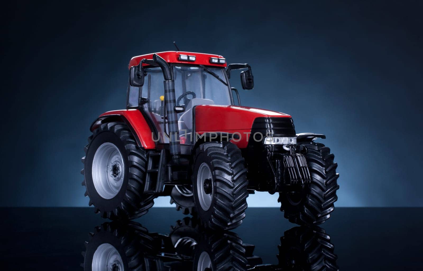 Tractor studio shot on blue background