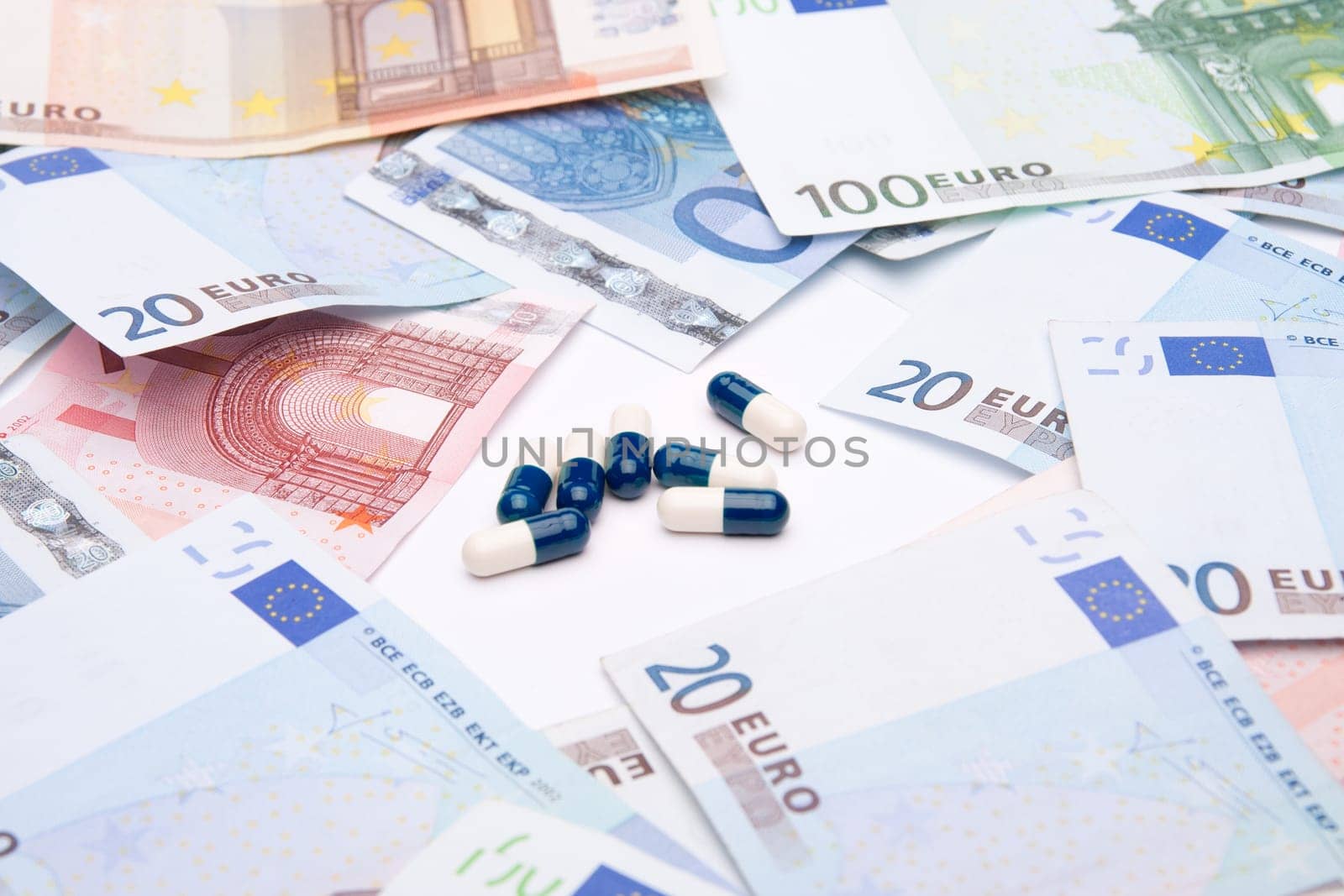 Buy health concept - drugs and money. Medicine and healthcare is a business.