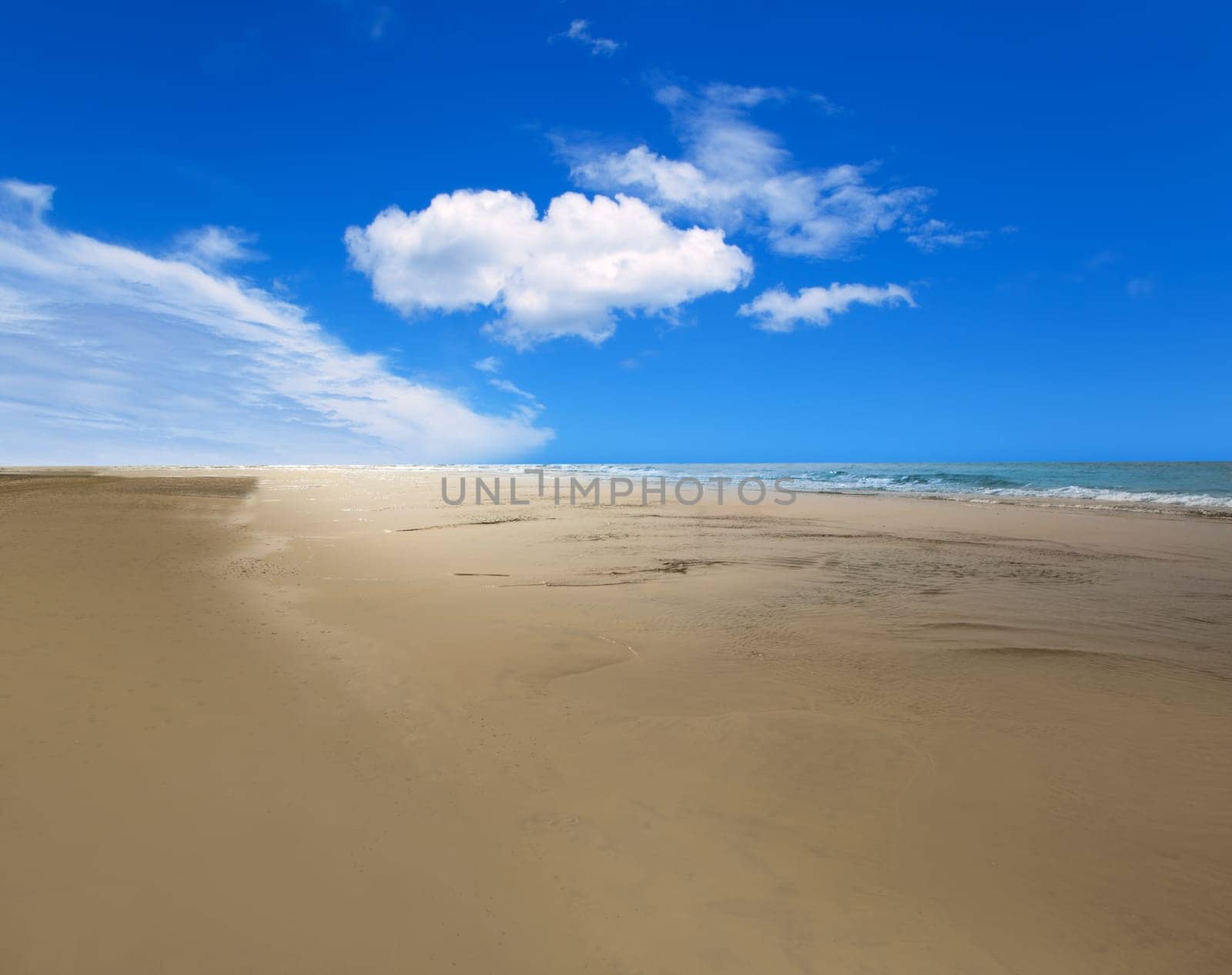 Maspalomas Playa del Ingles beach sand and blue sky in Gran Canaria