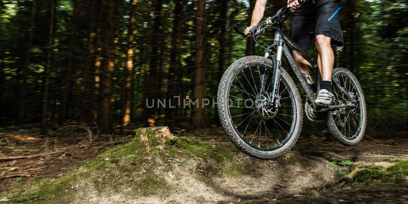 Mountain bikers in the jump