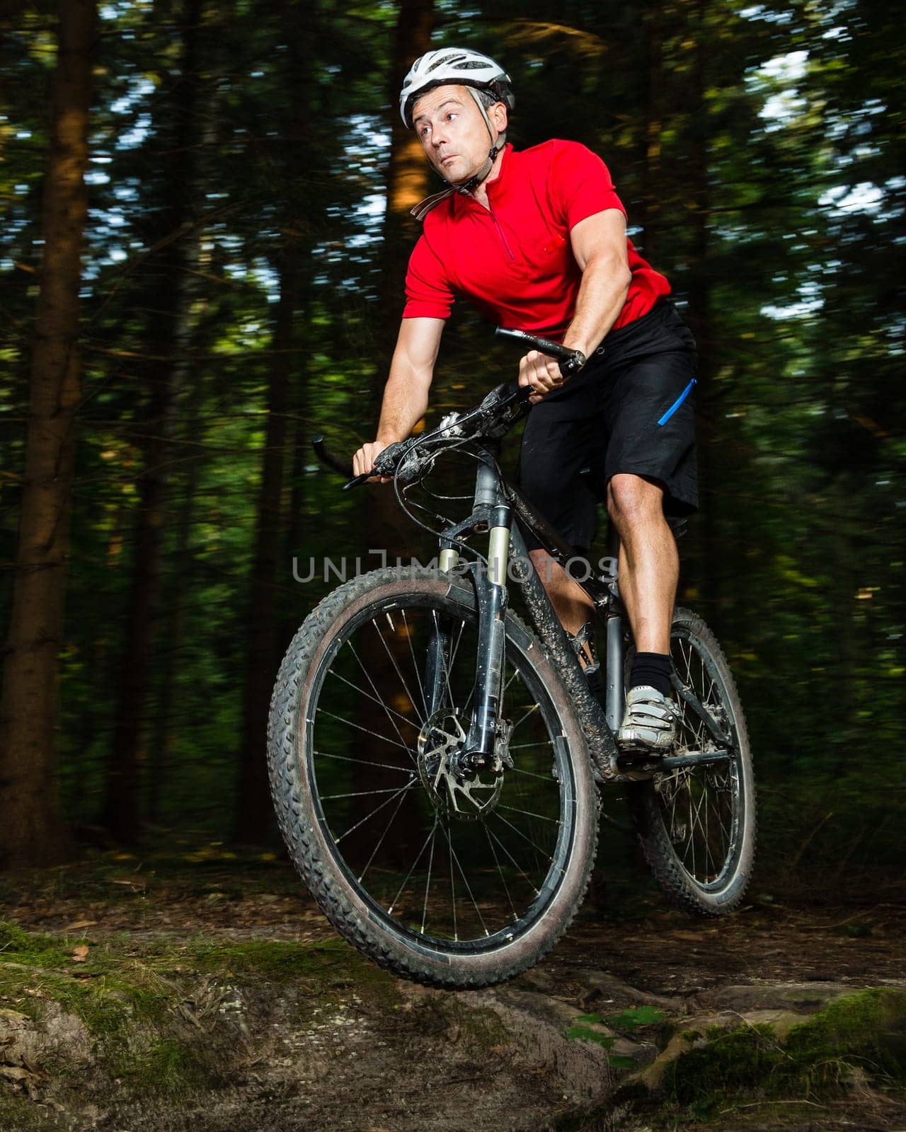 Mountain bikers in the jump