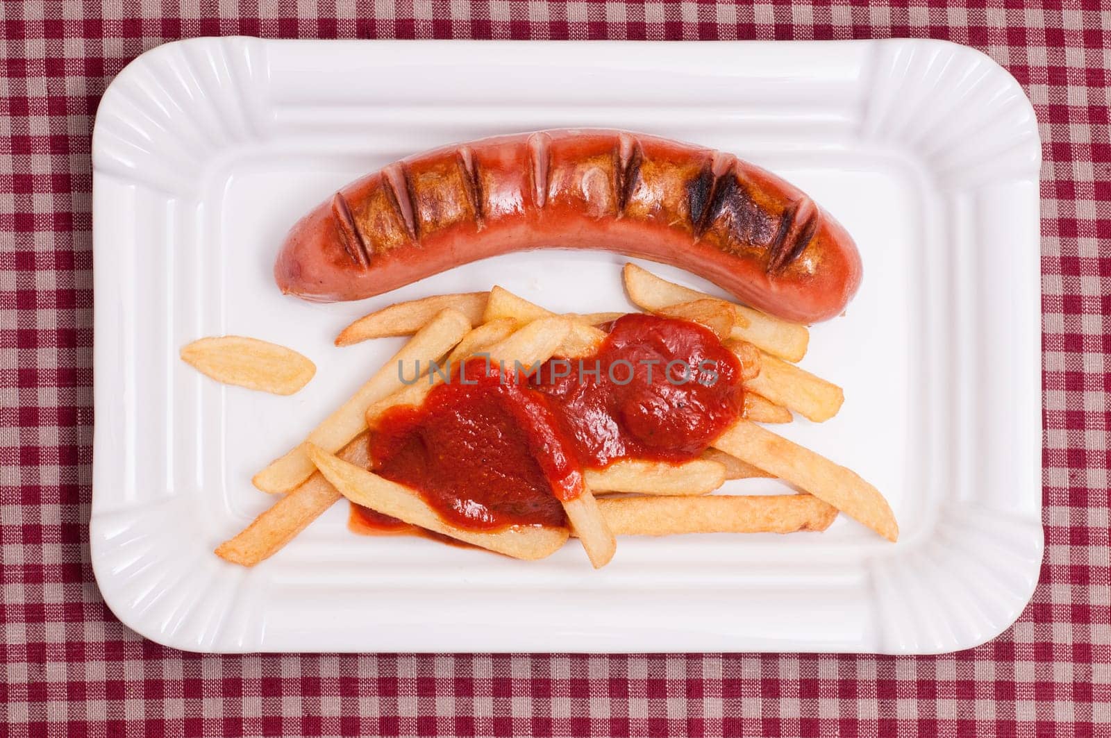 Grilled red sausage and French fries