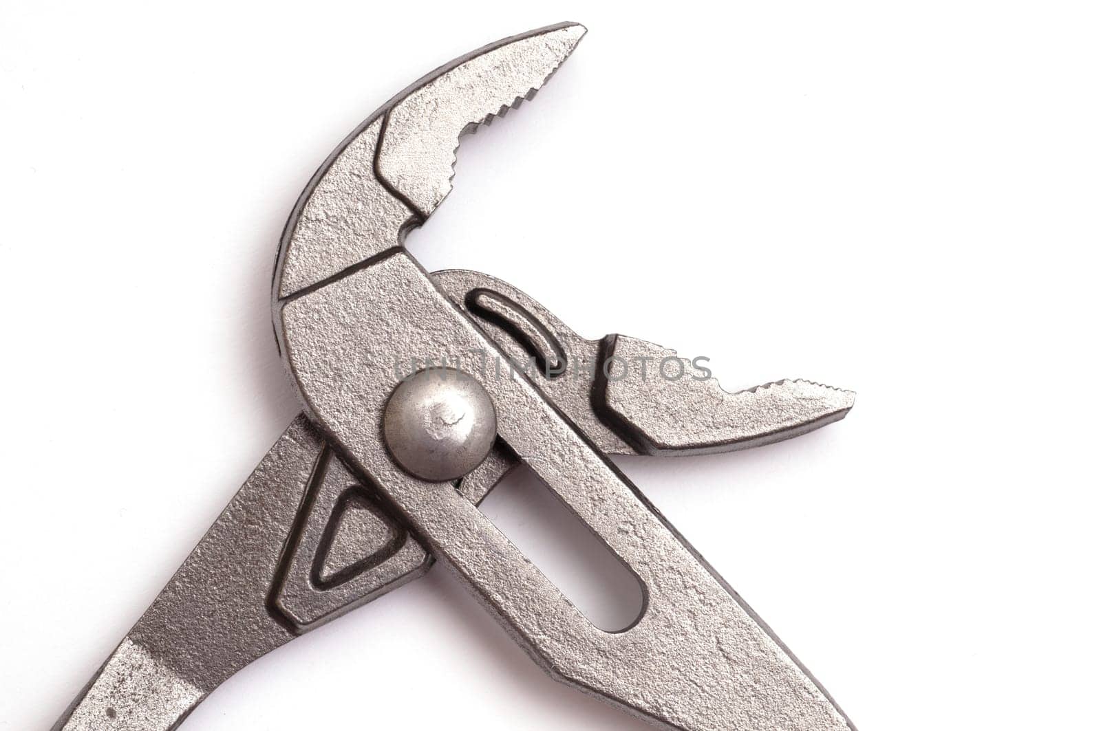 Close-up of a pipe wrench on white background