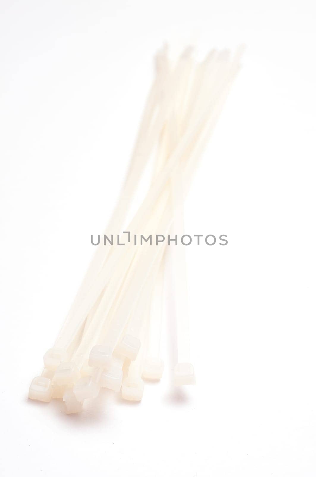 Cable ties in portrait mode on white background