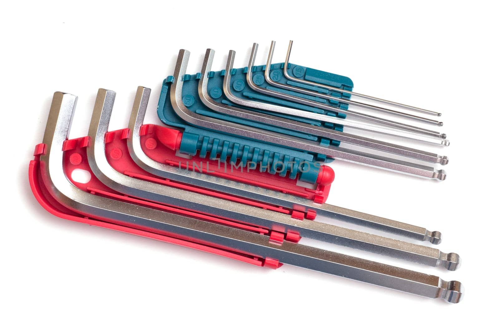 Set of different Allen keys on white background